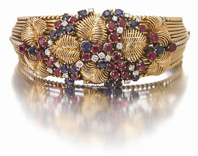 Rolex. A very fine and rare 18k white and rose gold, diamond, sapphire and ruby set concealed dial bracelet watch