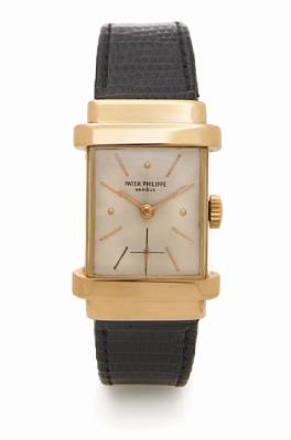 Patek Philippe. An 18k rose gold rectangular wristwatch
