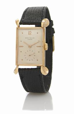Patek Philippe. A fine and rare 18k rose gold rectangular wristwatch with oversize sculpted lugs