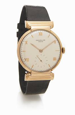 Patek Philippe. A fine and rare 18k rose gold wristwatch with tiered articulated shoulders