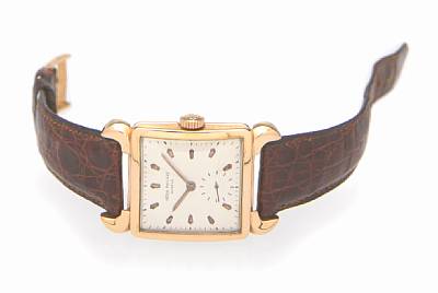 Patek Philippe. A fine and unusual 18k rose gold square wristwatch with horn lugs