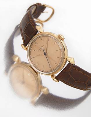Patek Philippe. A fine and rare 18k rose gold wristwatch with heavy conical shoulders