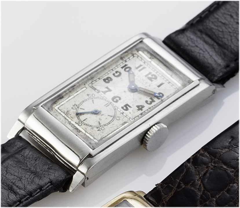 Rolex. A fine stainless steel rectangular wristwatch
