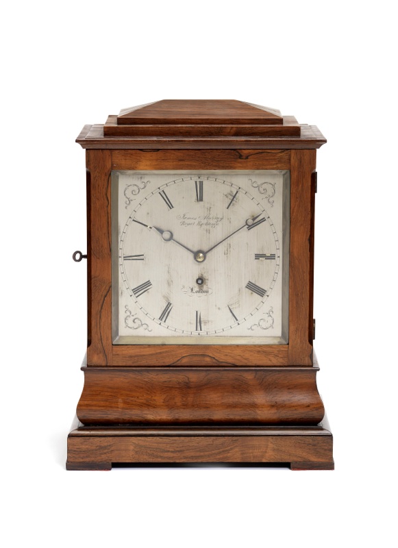 An early 19th century rosewood bracket timepiece