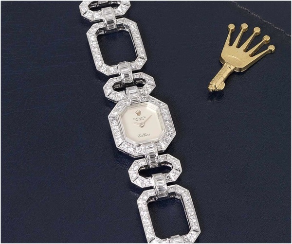 Rolex. A very fine and rare lady's platinum diamond set bracelet watch with fitted Rolex jewelery box