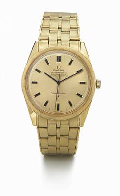 Omega. An 18k gold self-winding wristwatch on expanding Omega bracelet