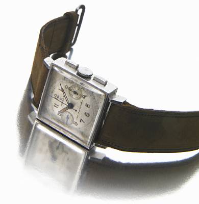 Rolex. A very rare stainless steel square cased anti-magnetic chronograph wristwatch