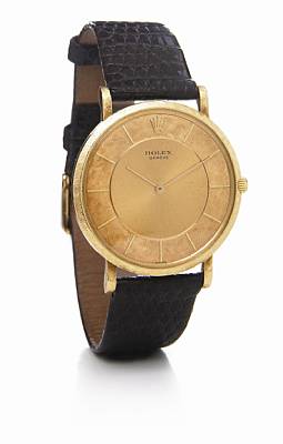 Rolex. An unusual 18k gold wristwatch in slim dust-proof case