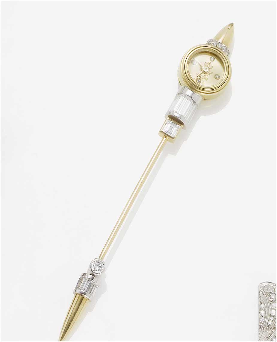 Royama. A stainless steel and gold diamond set jabot pin containing a watch with fitted box
