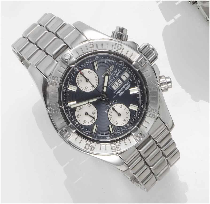 Breitling. A stainless steel automatic chronograph calendar bracelet watch