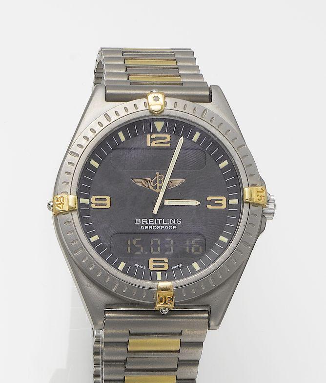 Breitling. A titanium analog and LCD digital display bracelet watch