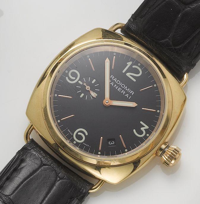 Panerai. A fine 18ct gold military-type automatic calendar wristwatch