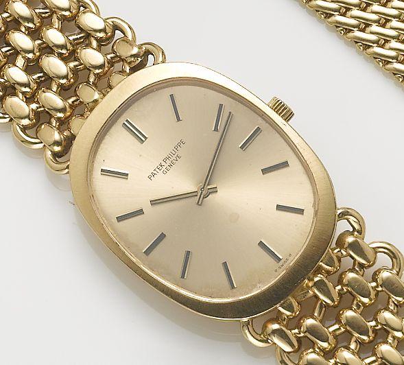 Patek Philippe. A fine 18ct gold bracelet watch with fitted box