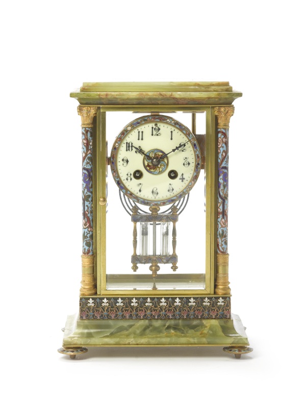 An early 20th century French onyx and champleve enamelled four-glass mantel clock