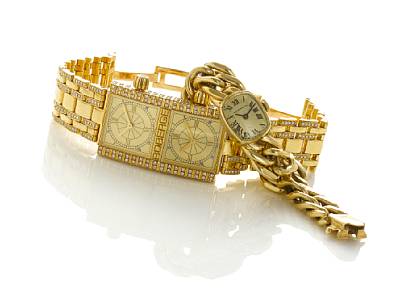 Roberge'. An 18k gold diamond set dual time bracelet watch