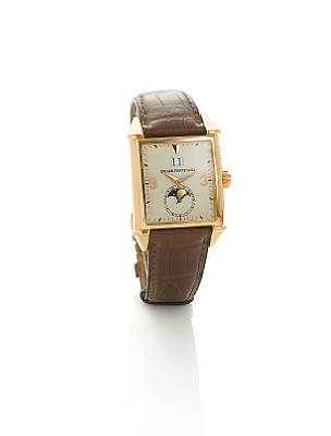 Girard-Perregaux. A fine 18k rose gold automatic calendar wristwatch with moon phases