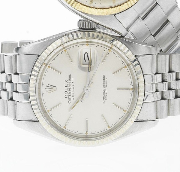 Rolex. A stainless steel automatic centre seconds calendar bracelet watch