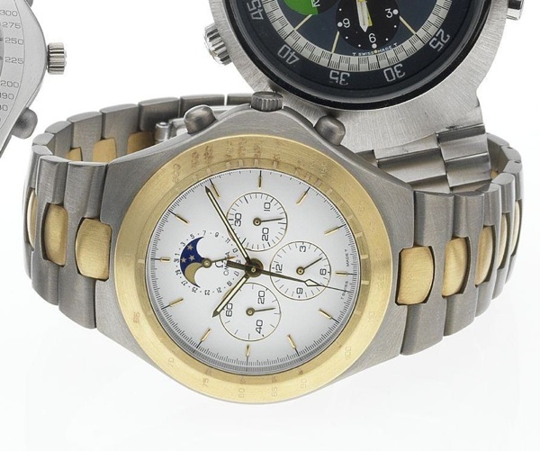 Omega. A fine and rare titanium and gold limited edition chronograph wristwatch with moon phases
