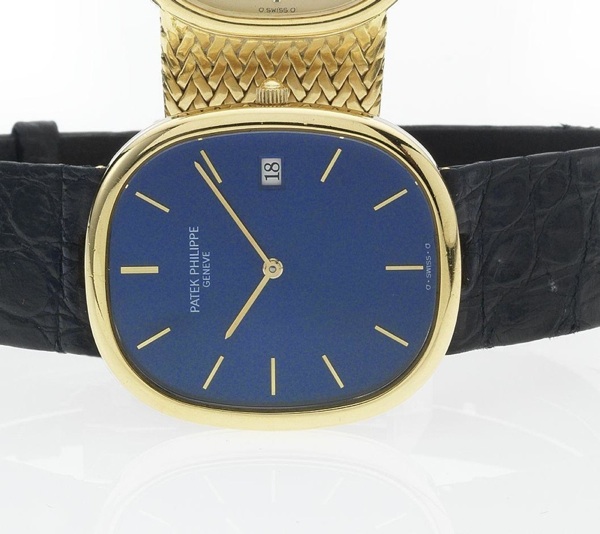 Patek Philippe. A fine 18ct gold quartz wristwatch with 18ct gold Patek Philippe buckle