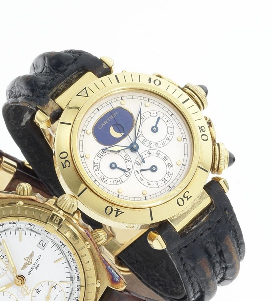 Cartier. A fine and rare 18ct gold calendar two time zone centre seconds wristwatch with moon phases