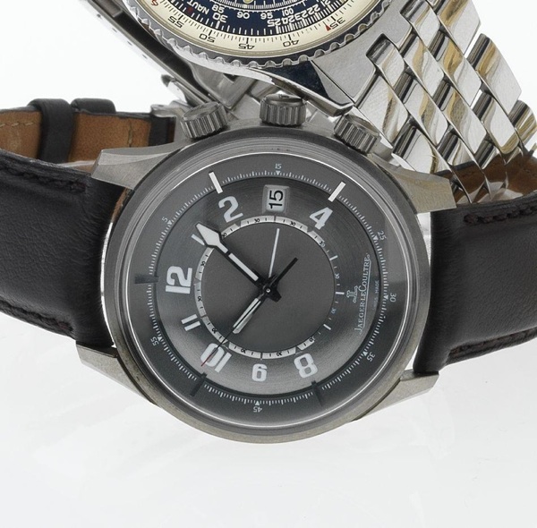 Jaeger Le Coultre. A fine titanium wristwatch with alarm, date and a titanium Jaeger Le Coultre deployant clasp