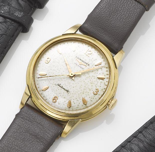 Longines. An 18ct gold automatic centre seconds wristwatch
