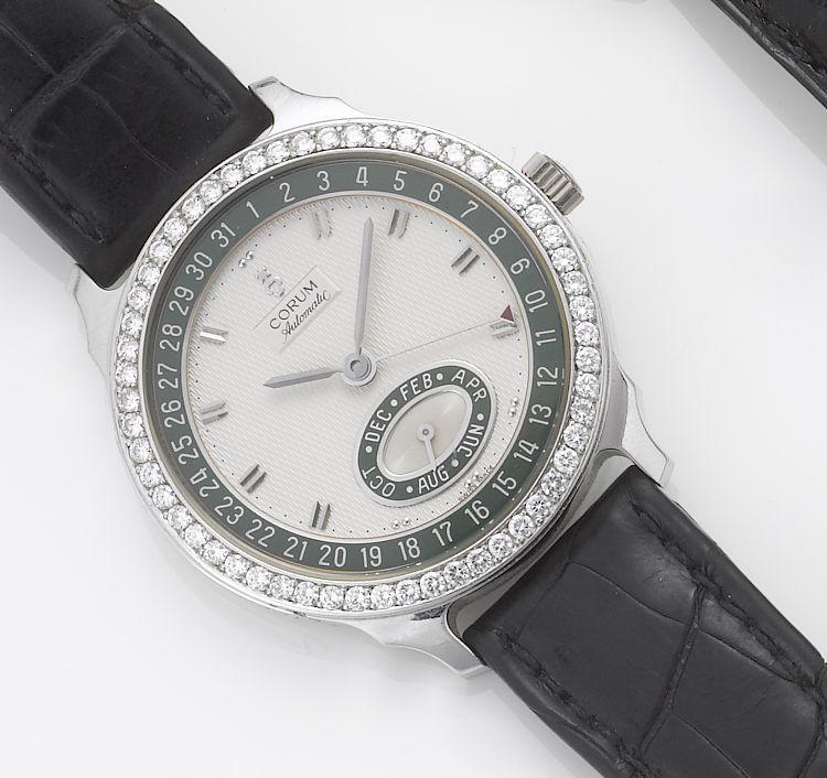 Corum. A fine limited edition 18ct white gold diamond set automatic calendar wristwatch together with presentation box