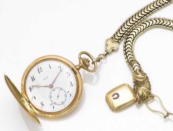 Invar. An early 20th century 14ct gold full hunter pocket watch together with chain and locket