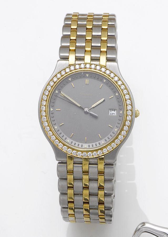 Chopard. A lady's stainless steel, gold, diamond set centre seconds calendar bracelet watch