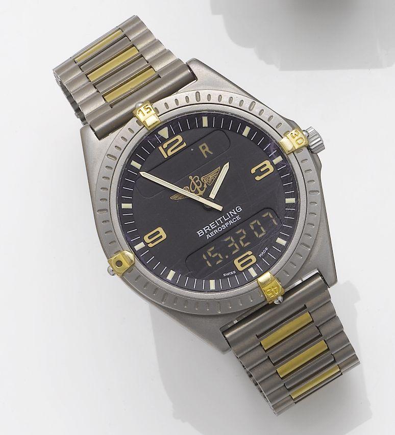 Breitling. A titanium analog and LCD digital display bracelet watch