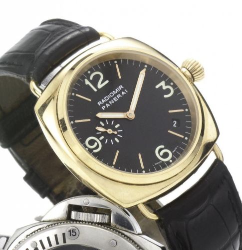 Officine Panerai. A fine 18ct gold automatic calendar wristwatch together with fitted box and papers