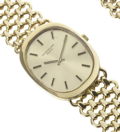 Patek Philippe. A fine 18ct gold bracelet watch together with Extract from Archives