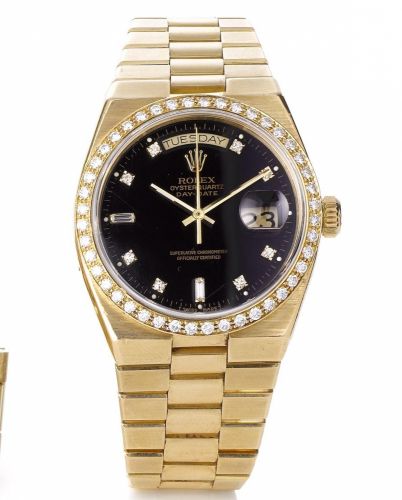 Rolex. A fine 18ct gold diamond set quartz calendar bracelet watch
