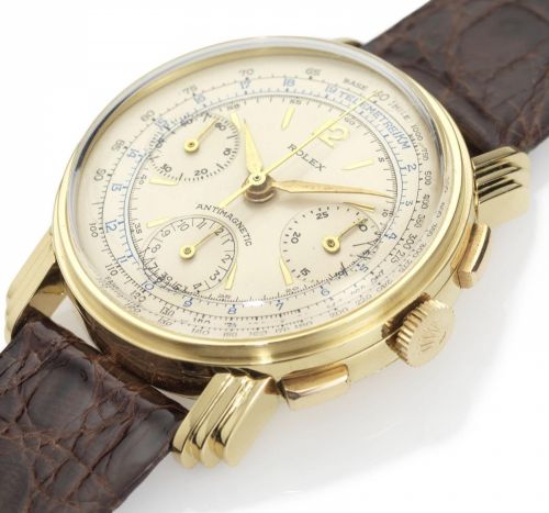 Rolex. A fine and rare 18ct gold chronograph wristwatch with fancy lugs