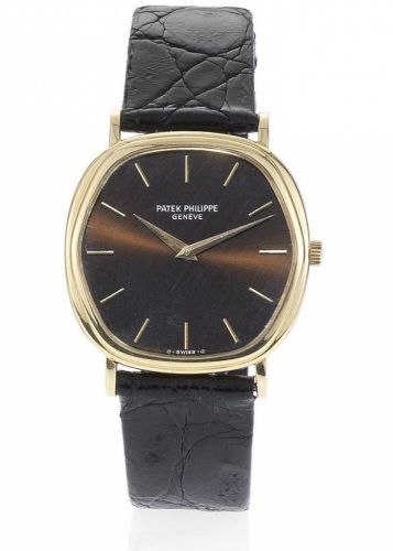 Patek Philippe. A fine 18ct gold automatic hexagonal shaped wristwatch together with Extract from Archives