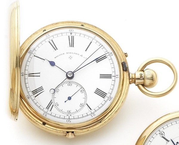 Nicole Nielson & Co. An 18ct gold keyless wind full hunter chronograph pocket watch Numbered 1198, London Hallmark for 1882