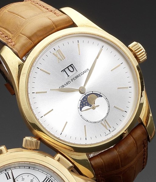 Girard Perregaux. An 18ct gold automatic calendar wristwatch with phases of the moon Clásico Big date, Ref:49530, Circa 2004