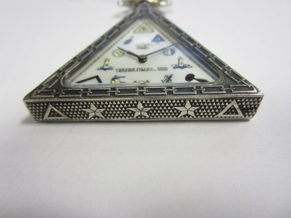 Solvil Watch Co. A Masonic silver open face keyless wind triangular shaped pocket watch