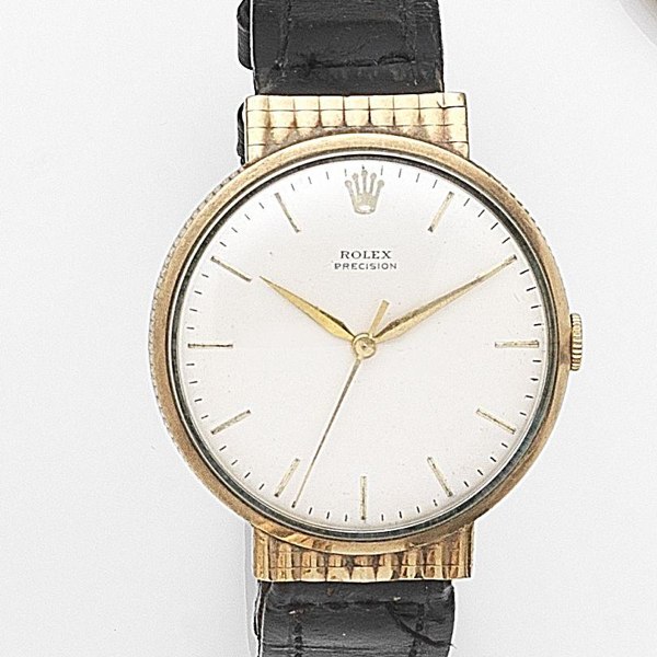 Rolex. A 9ct gold manual wind centre seconds wristwatch