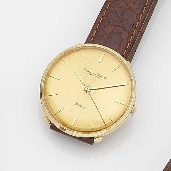 IWC. An 18ct gold manual wind centre seconds wristwatch