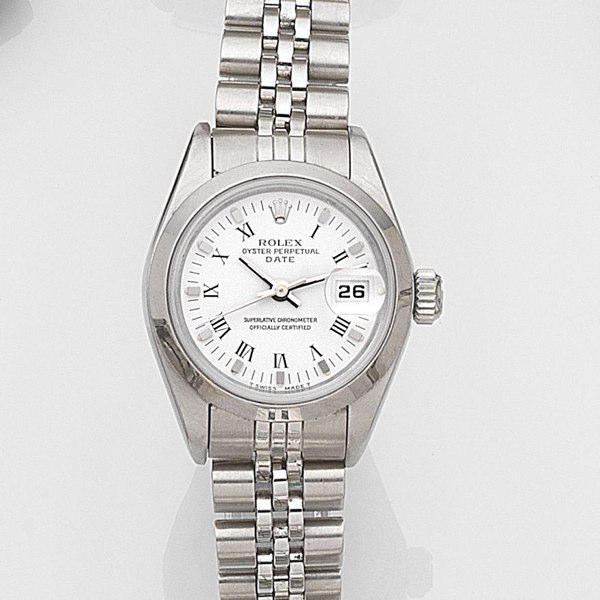 Rolex. A lady's stainless steel automatic calendar bracelet watch