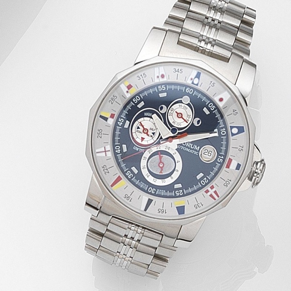 Corum. A stainless steel automatic calendar bracelet watch with tide indicator