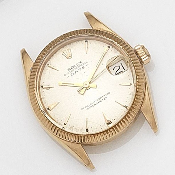 Rolex. An 18ct gold automatic calendar bracelet watch