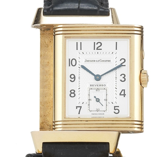 Jaeger LeCoultre. An 18ct rose gold manual wind reversible wristwatch with box and papers