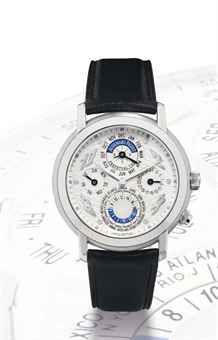 AUDEMARS PIGUET. A VERY FINE AND RARE 18K WHITE GOLD AUTOMATIC PERPETUAL CALENDAR WORLD TIME WRISTWATCH WITH LEAP YEAR INDICATION