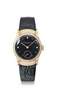 Patek Philippe. An attractive and extremely rare 18K pink gold wristwatch with black lacquer dial and hooded lugs