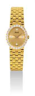 PIAGET. A LADY'S 18K GOLD AND DIAMOND-SET OVAL BRACELET WATCH