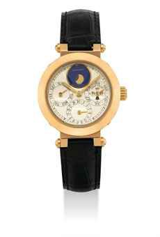 GERALD GENTA. AN 18K GOLD AUTOMATIC PERPETUAL CALENDAR WRISTWATCH WITH MOON PHASES AND LEAP YEAR INDICATION