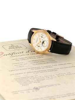 PATEK PHILIPPE. A FINE AND RARE 18K GOLD AUTOMATIC PERPETUAL CALENDAR WRISTWATCH WITH MOON PHASES, LEAP YEAR AND 24 HOUR INDICATION AND ORIGINAL CERTIFICATE