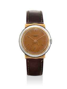 PATEK PHILIPPE. A RARE AND UNUSUAL STAINLESS STEEL AND 18K GOLD WRISTWATCH WITH PINK DIAL AND HOODED LUGS